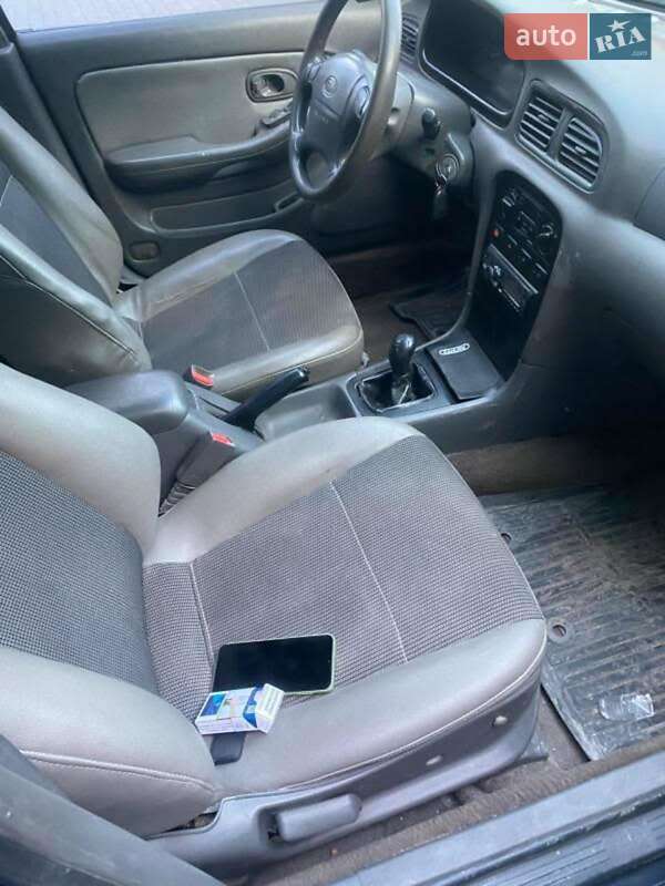 Фото Kia Clarus з оголошення AUTO.RIA